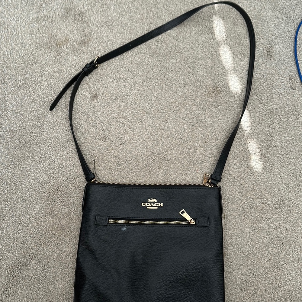 Coach shoulder bag with white stain
